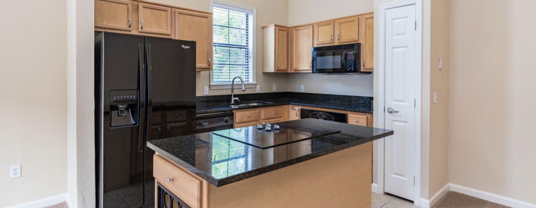 glass stove top in kitchen island